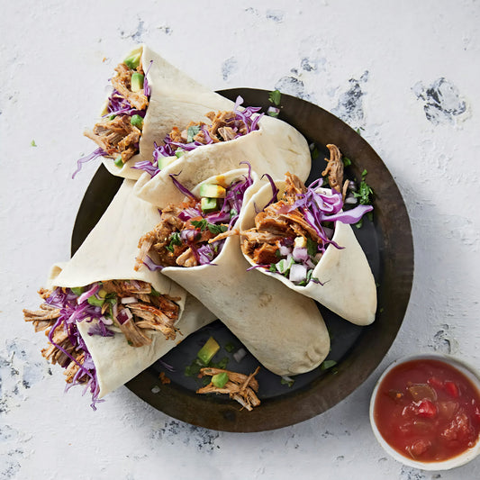 Sriracha pulled pork wrap with garden salad